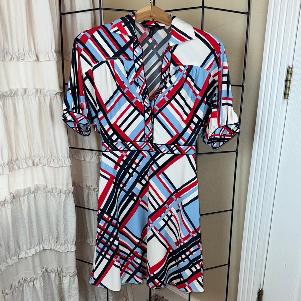 BCBGMaxAzria geometric print v-neck dress in red, blue, black, and white